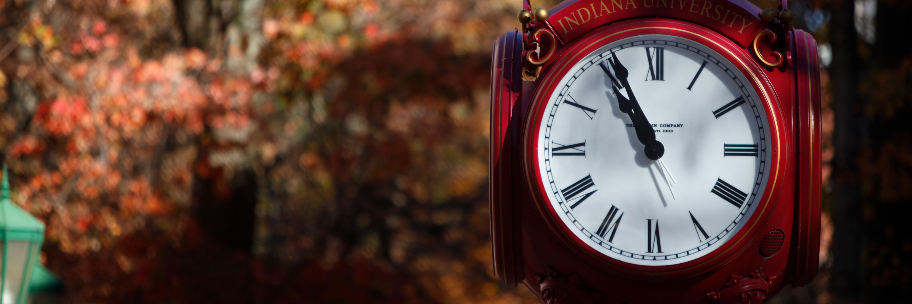 Indiana University red analog clock with gold accents